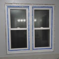 Painting the window frame.JPG